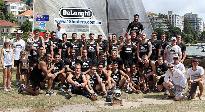 2014 National Rugby League chhampion South Sydney team with the De'Longhi skiff and JJ Giltinan Trophy © Frank Quealey /Australian 18 Footers League http://www.18footers.com.au
